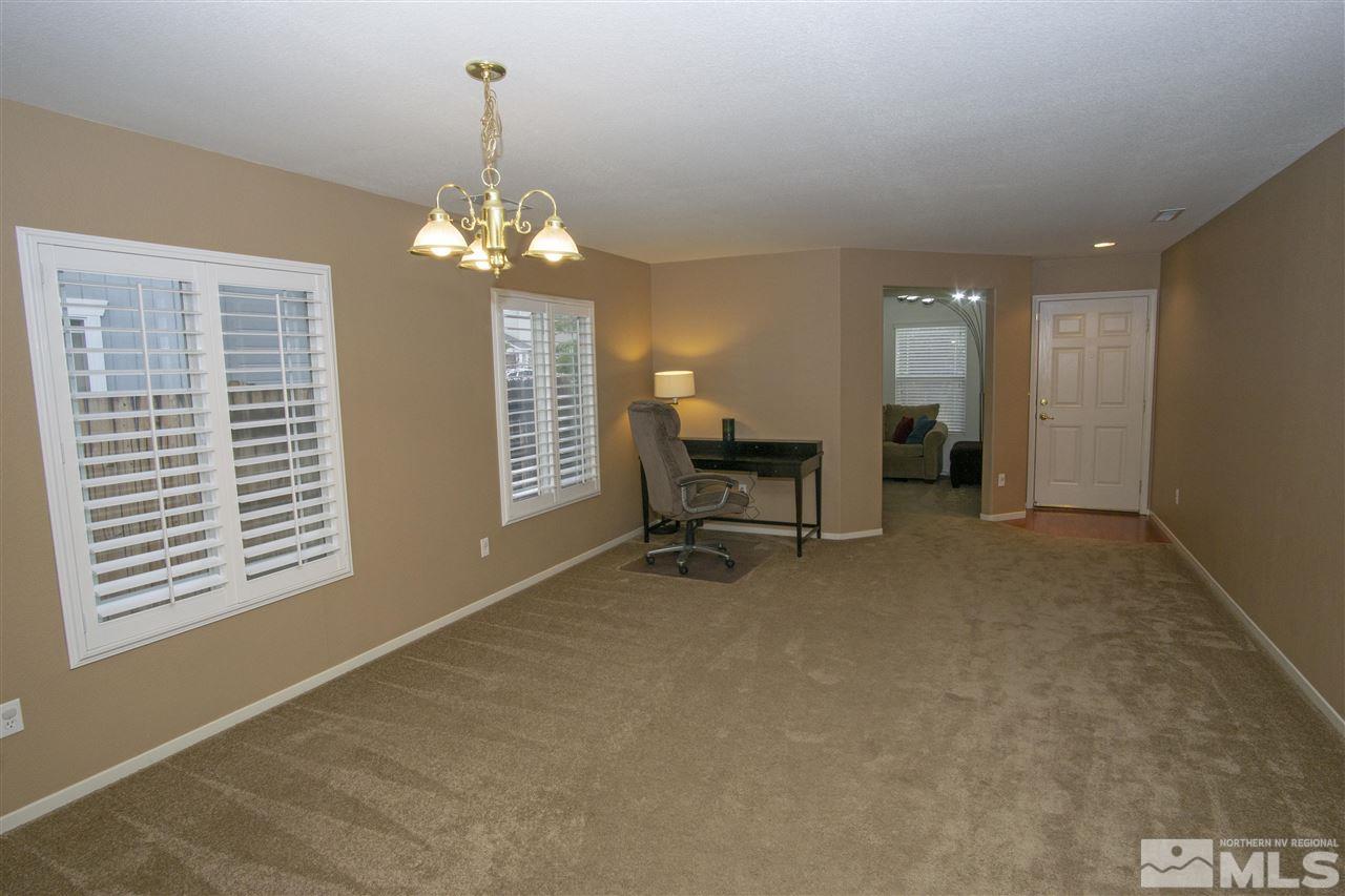 7692 Corso Street Reno, NV 89506 - Photo 6 of 23 a view of work space with windows and furniture