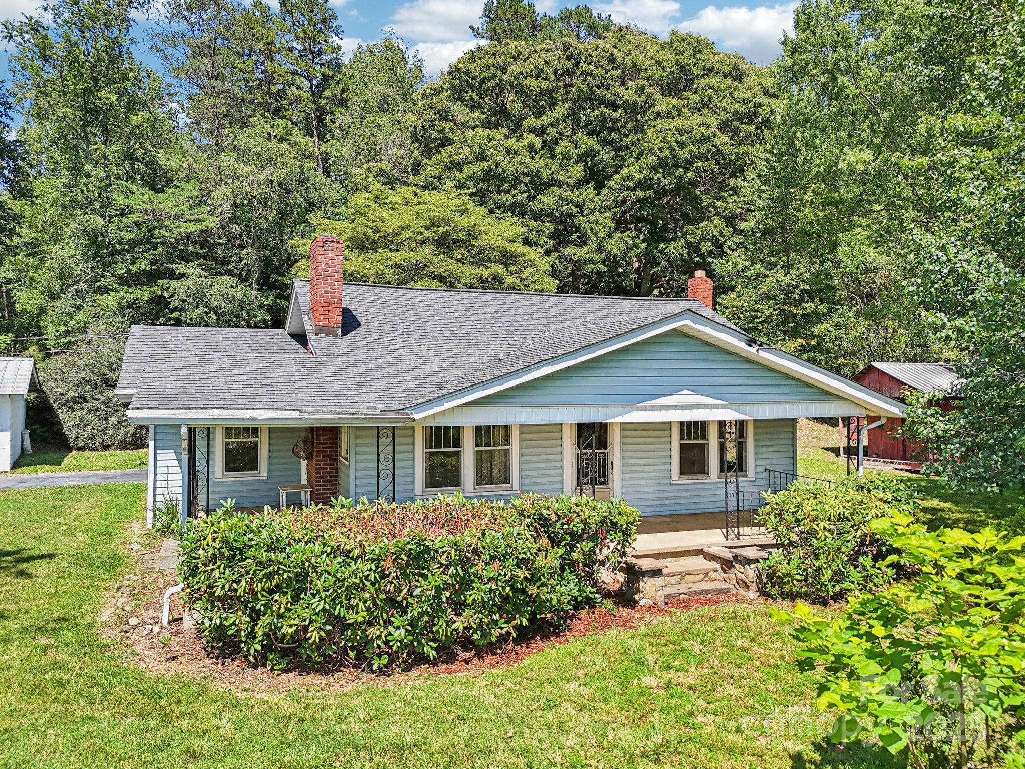 a house that has a lot of plants in it
