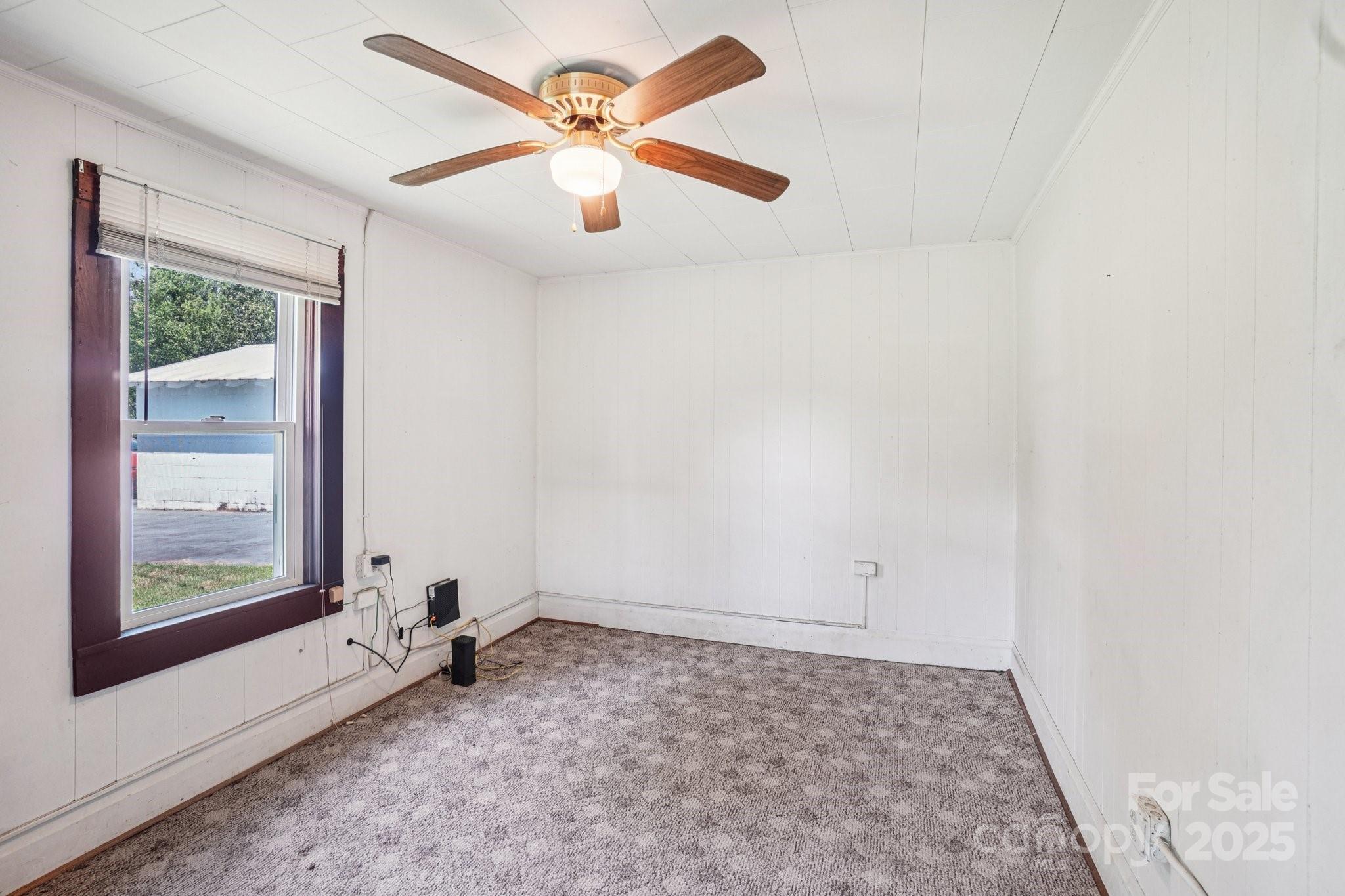 203 North Beaverdam Road Candler, NC 28715 - Photo 13 of 40 an empty room with a window