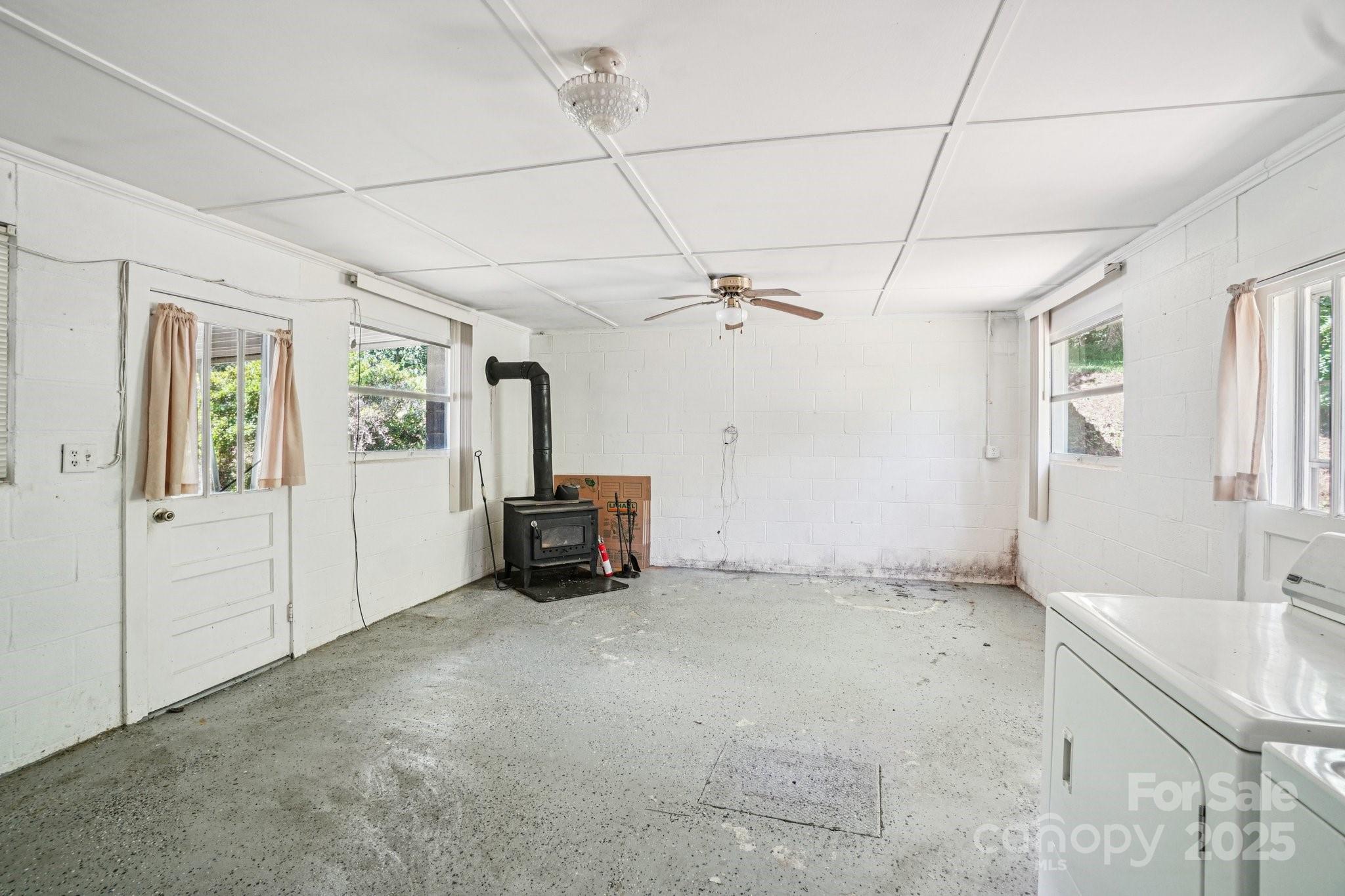 203 North Beaverdam Road Candler, NC 28715 - Photo 23 of 40 a view of an empty room with a window