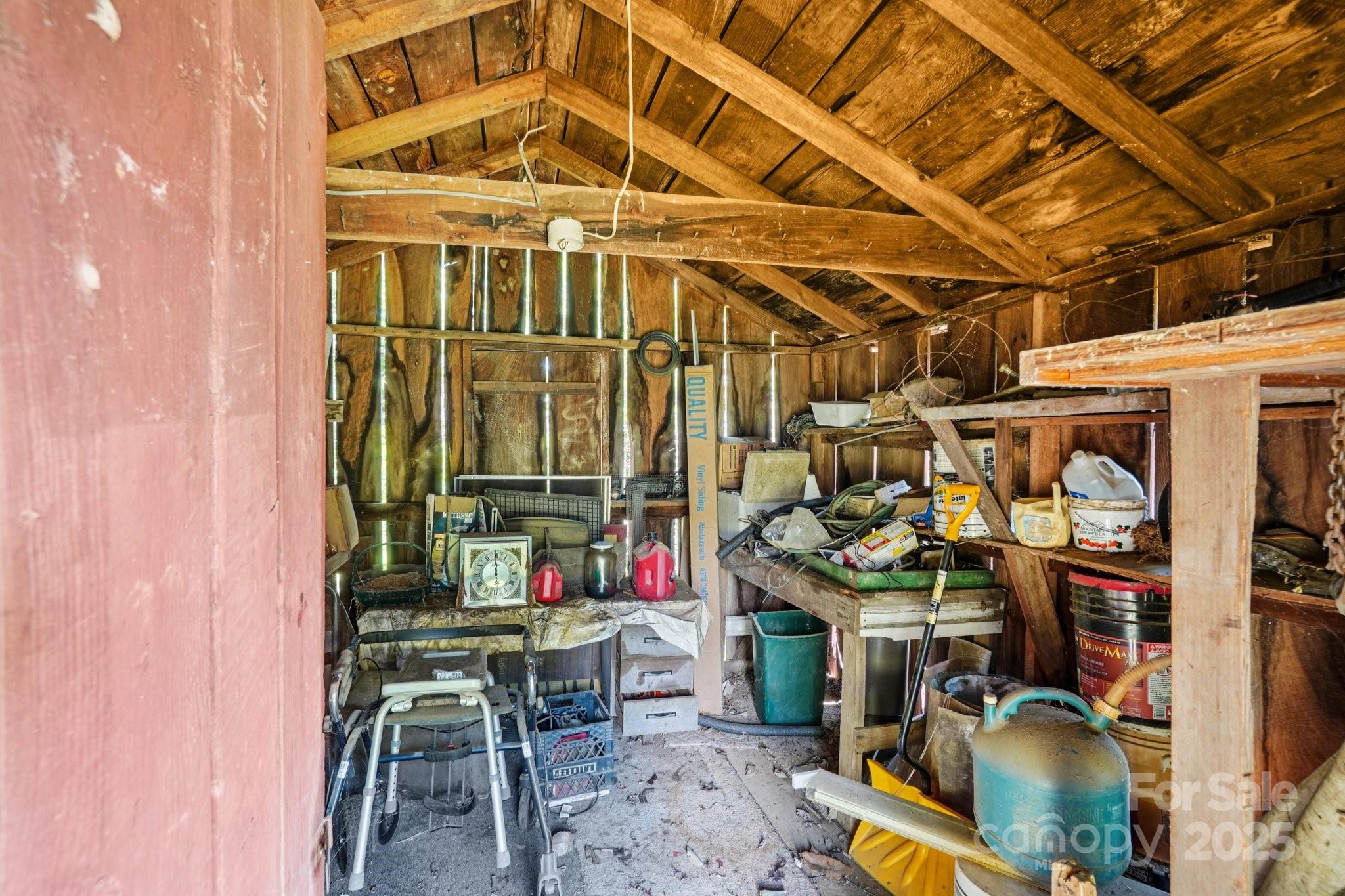 203 North Beaverdam Road Candler, NC 28715 - Photo 32 of 40 a view of a chairs with table in it