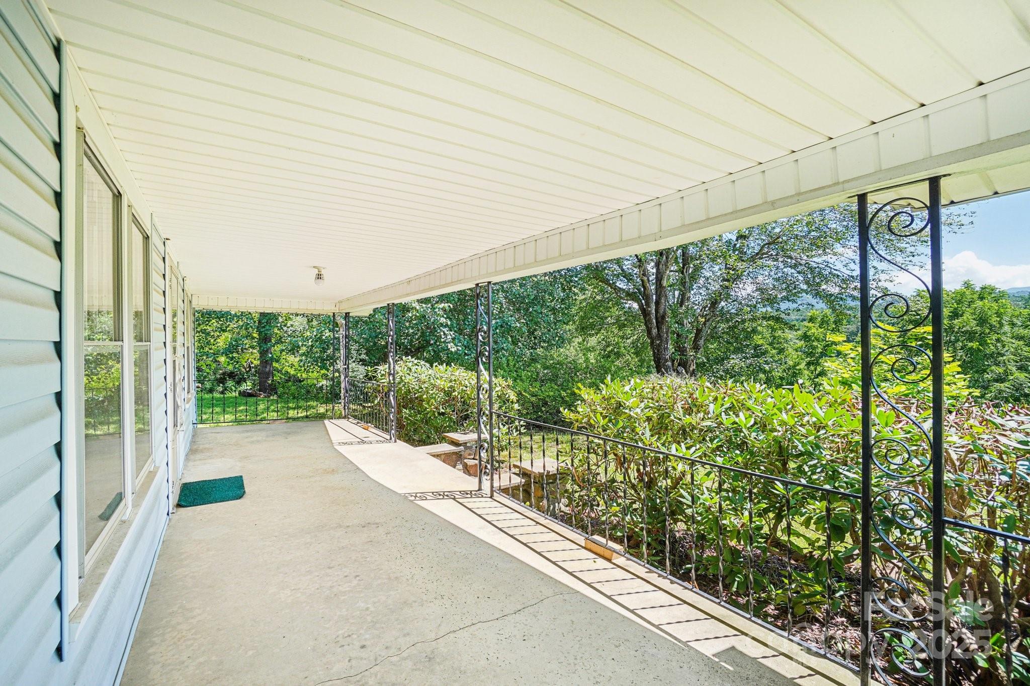 203 North Beaverdam Road Candler, NC 28715 - Photo 7 of 40 a view of a garden
