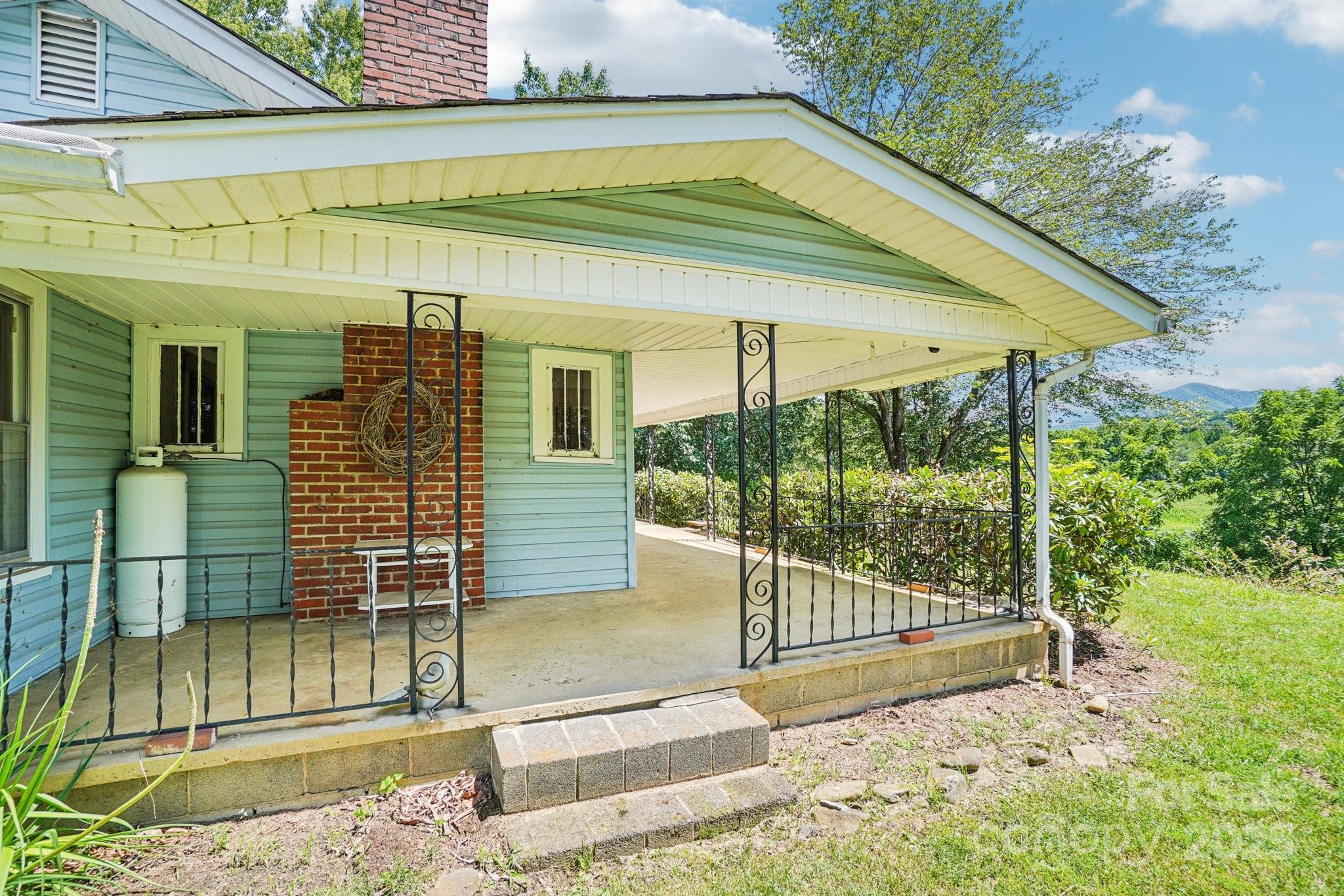 203 North Beaverdam Road Candler, NC 28715 - Photo 9 of 40 a view of a house with a outdoor space