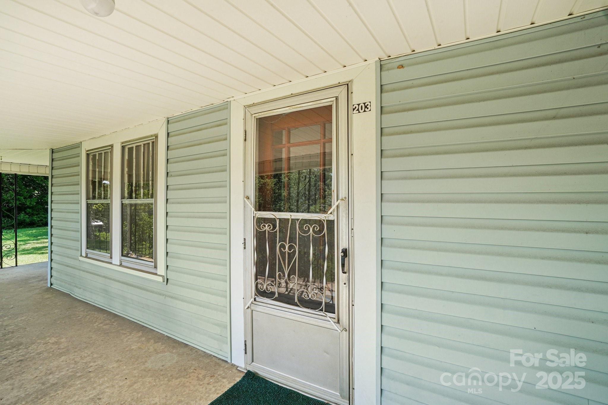 203 North Beaverdam Road Candler, NC 28715 - Photo 10 of 40 a view of a balcony