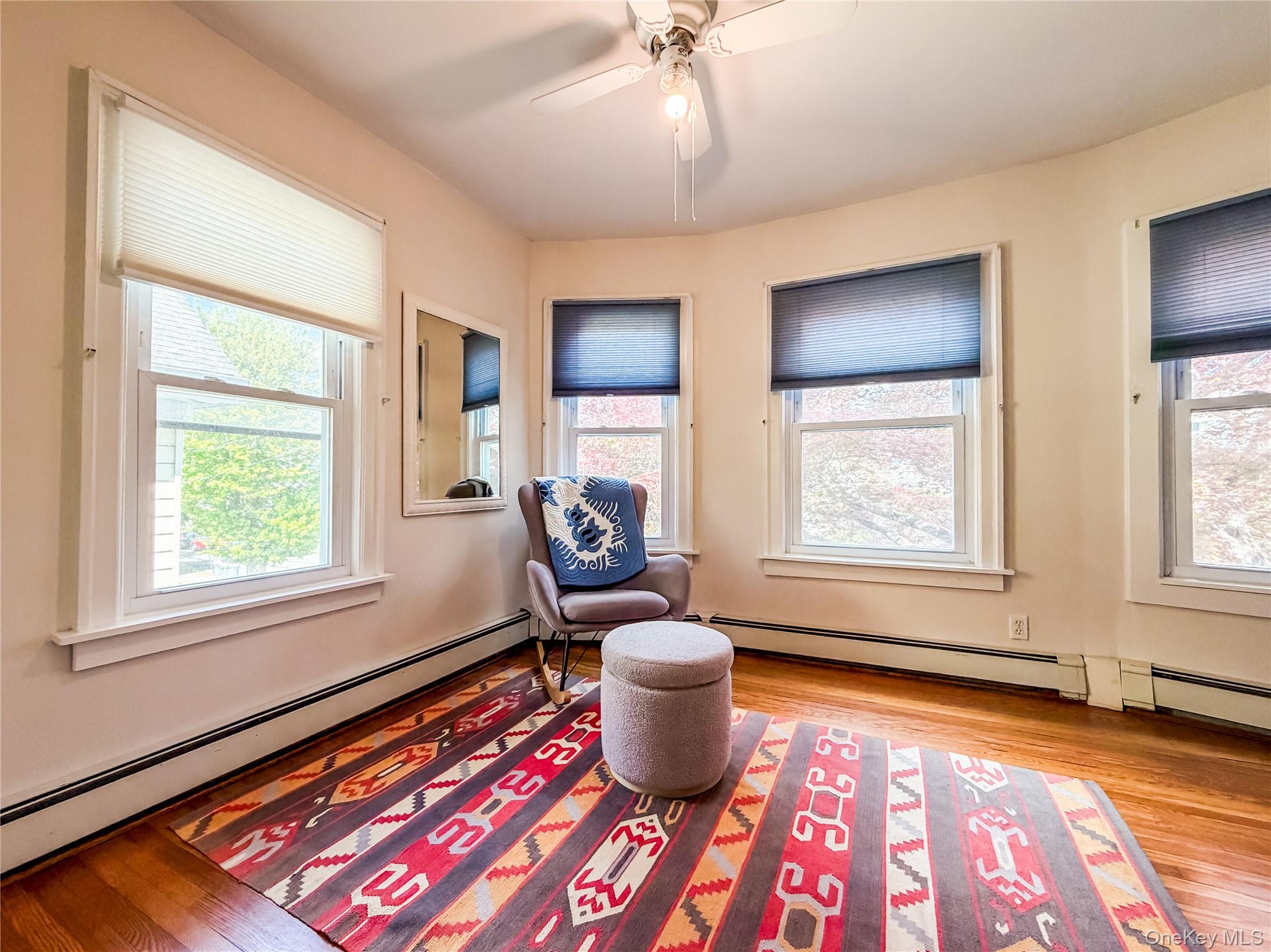 350 Smith Street Peekskill, NY 10566 - Photo 23 of 32 a living room with a rug and a window
