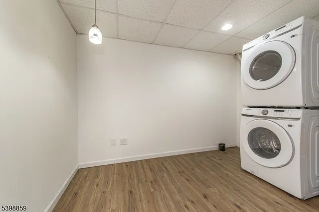 a view of a storage & utility room with wooden floor