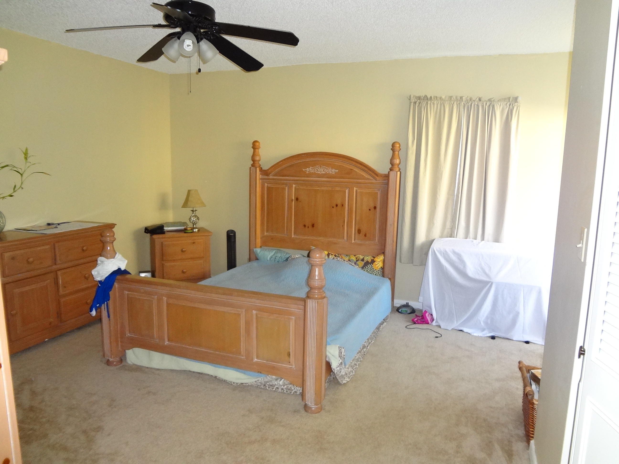 22477 Vistawood Way Boca Raton, FL 33428 - Photo 10 of 12 a bedroom with a bed and wooden floor