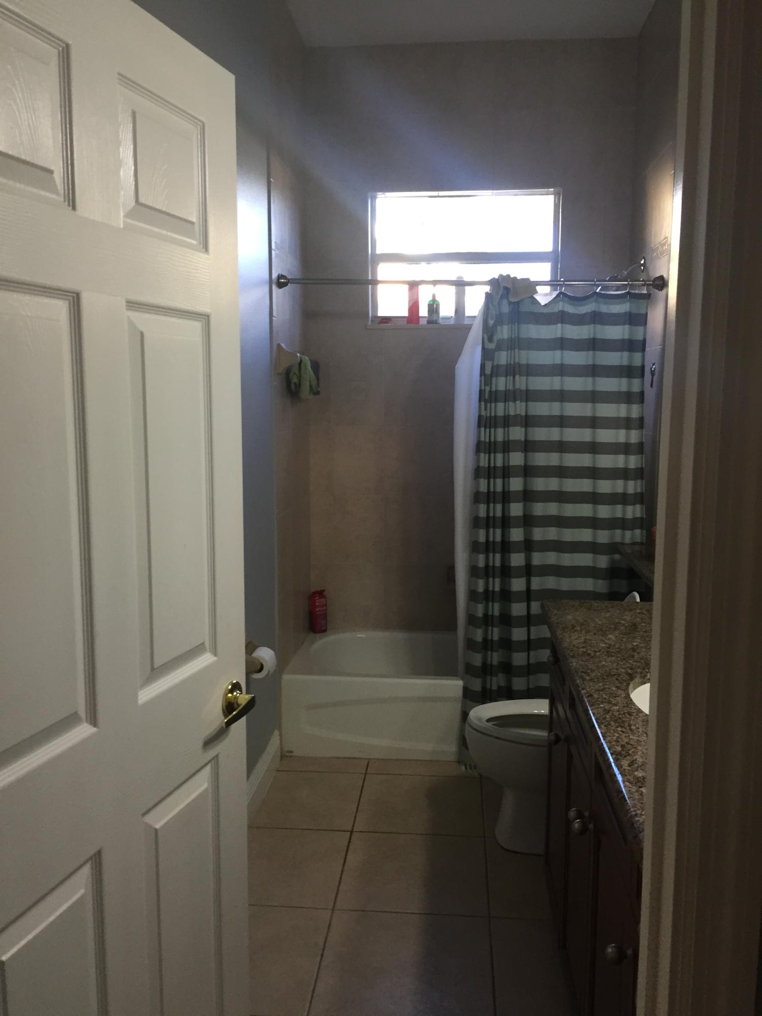 602 Southwest Dairy Road Port St. Lucie, FL 34953 - Photo 13 of 26 Bathroom 2