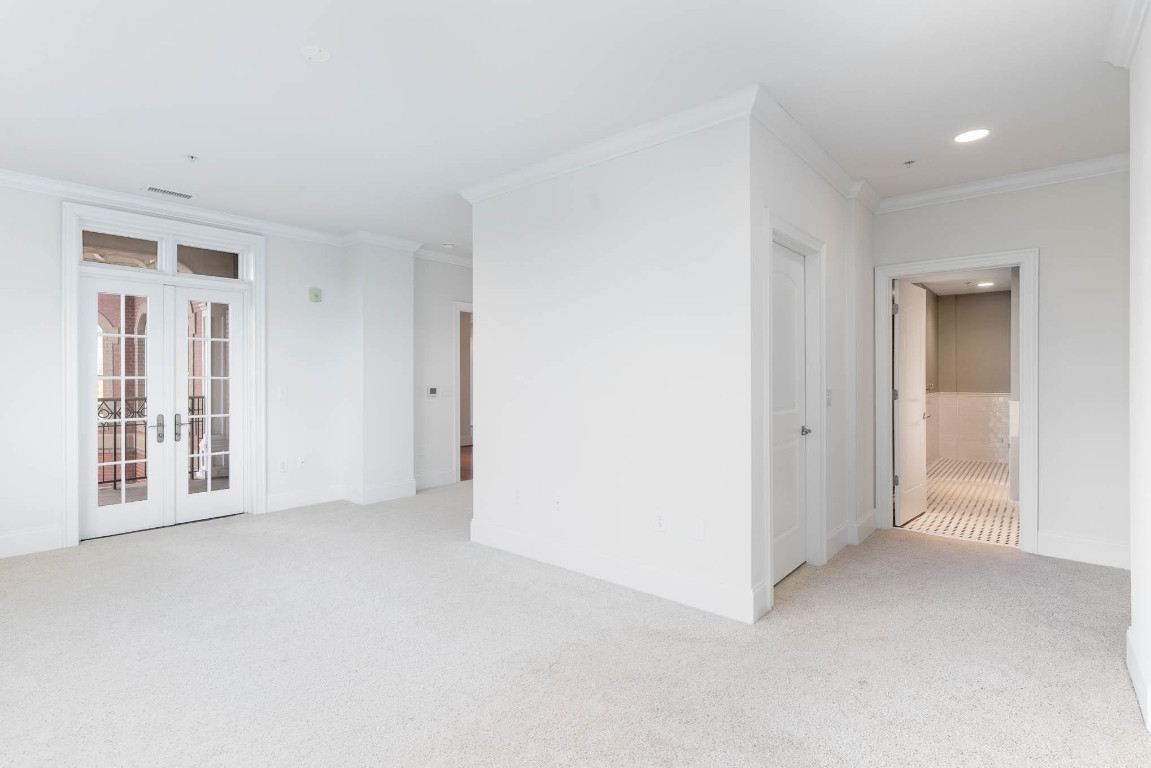 710 Independence Place, Unit 606 Raleigh, NC 27603 - Photo 18 of 21 a view of an empty room with a window