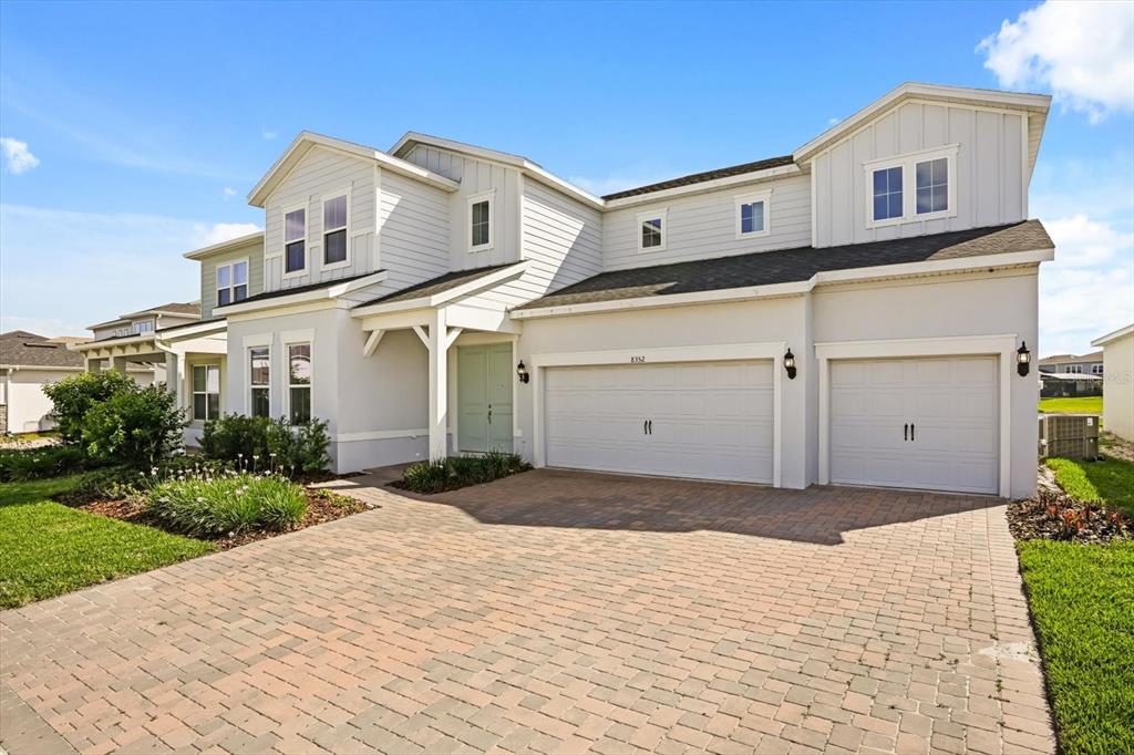 8352 Pk Clf Way Orlando, FL 32836 - Photo 1 of 55 a front view of a house with a yard