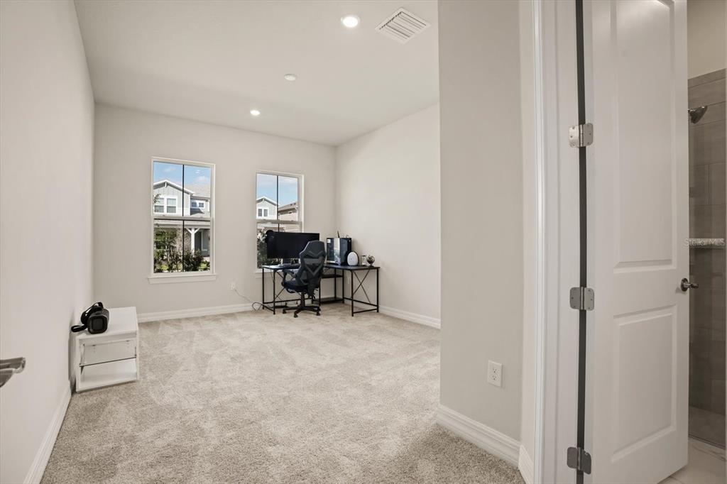 8352 Pk Clf Way Orlando, FL 32836 - Photo 17 of 55 a view of a livingroom with workspace and a couch