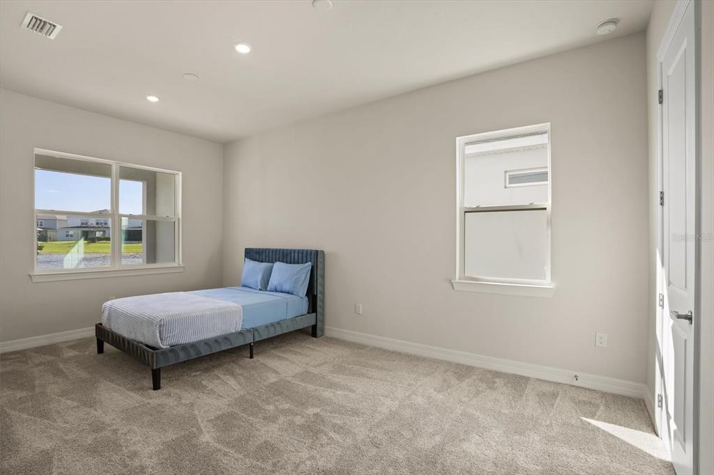 8352 Pk Clf Way Orlando, FL 32836 - Photo 19 of 55 a room with a bed and a window