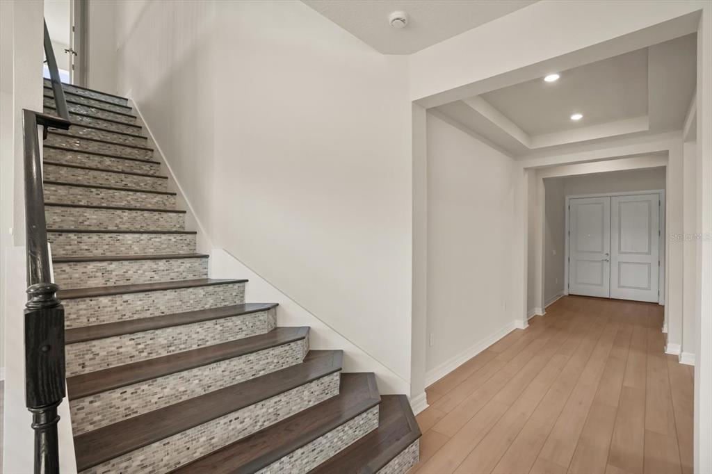 8352 Pk Clf Way Orlando, FL 32836 - Photo 25 of 55 a view of entryway with wooden floor