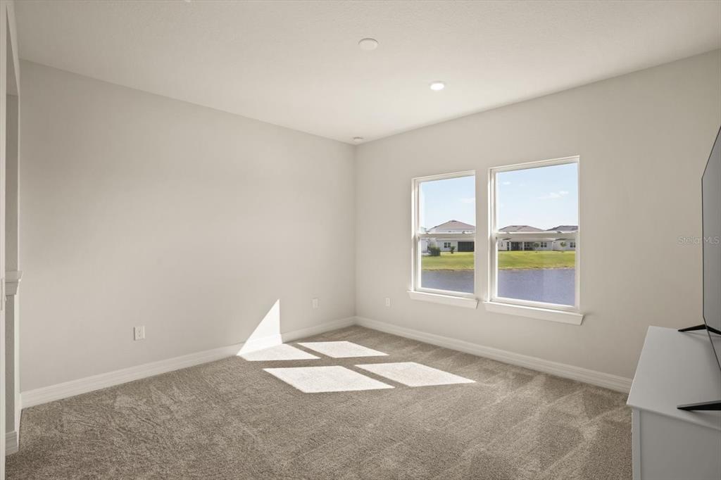 8352 Pk Clf Way Orlando, FL 32836 - Photo 35 of 55 a view of an empty room with a window
