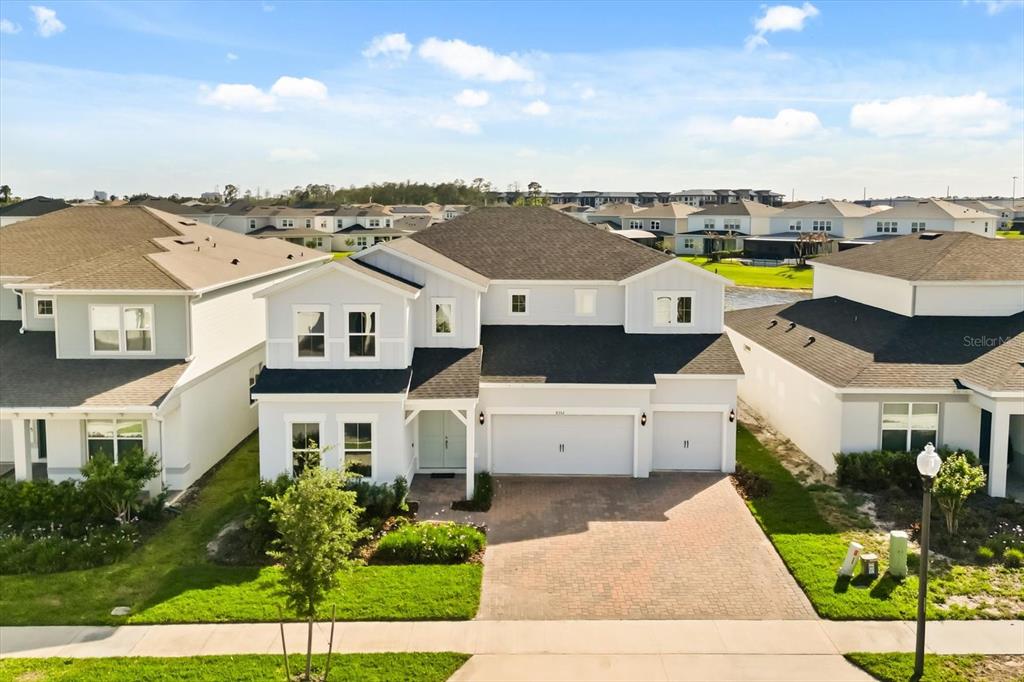 8352 Pk Clf Way Orlando, FL 32836 - Photo 4 of 55 a view of a white building among the street