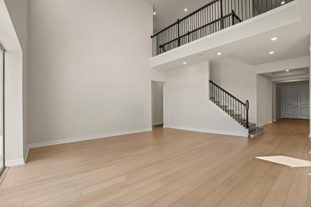 8352 Pk Clf Way Orlando, FL 32836 - Photo 8 of 55 a view of an entryway with wooden floor