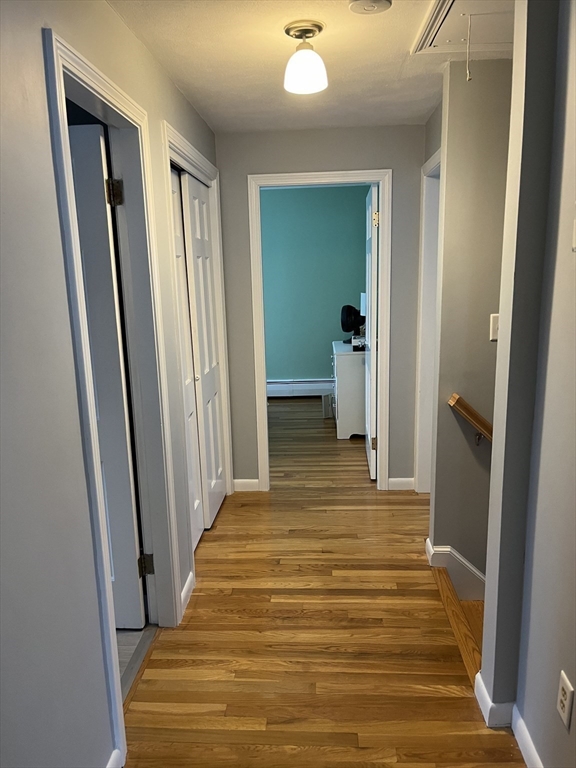 38 Chevy Chase Road Worcester, MA 01606 - Photo 17 of 35 a view of a hallway with wooden floor and staircase