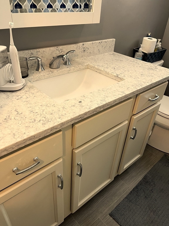 38 Chevy Chase Road Worcester, MA 01606 - Photo 20 of 35 a bedroom with a bed and cabinet