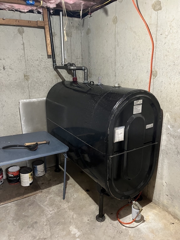 38 Chevy Chase Road Worcester, MA 01606 - Photo 32 of 35 a living room with a table chairs and a window