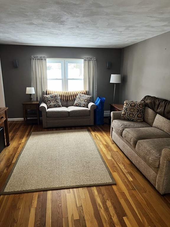 38 Chevy Chase Road Worcester, MA 01606 - Photo 5 of 35 a living room with furniture and a couch