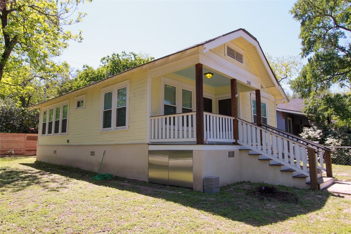 1301 South 6th Street Austin, TX 78704 - Photo 3 of 35 a view of a house with a yard