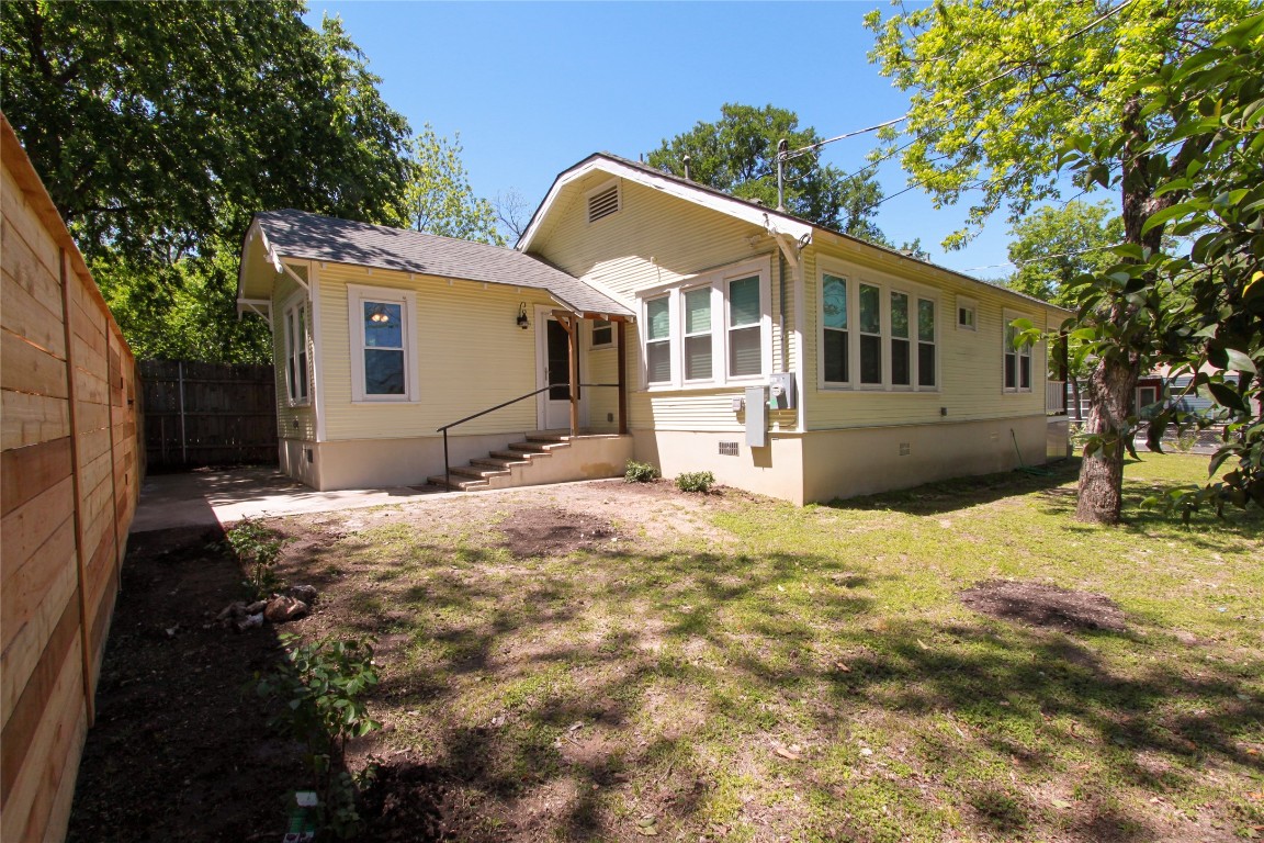 1301 South 6th Street Austin, TX 78704 - Photo 31 of 35 a front view of a house with a yard