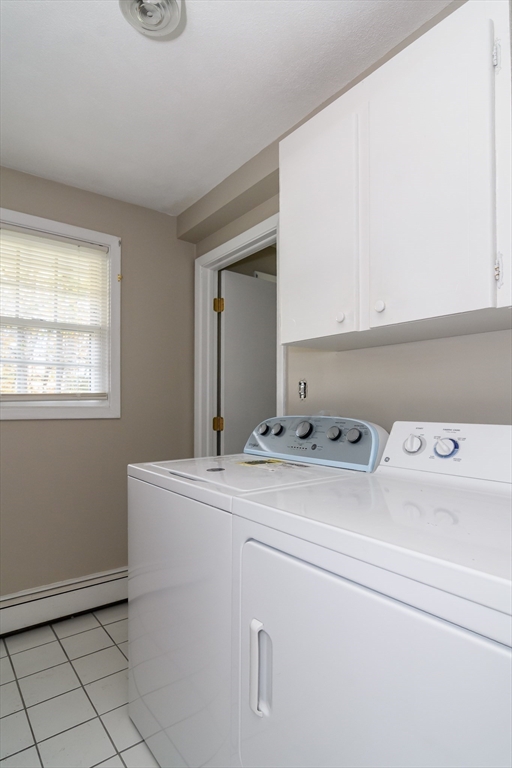 3 Hickory Lane, Unit 3 Framingham, MA 01701 - Photo 20 of 24 a utility room with dryer and washer