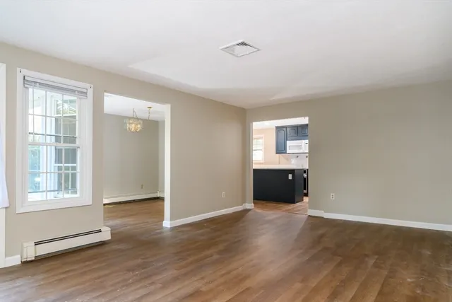 wooden floor and windows in an empty room