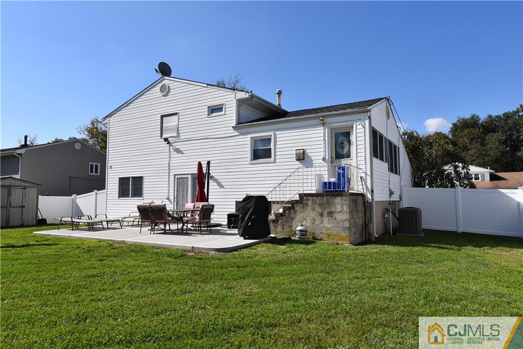 15 Dumas Road Old Bridge, NJ 08857 - Photo 15 of 15 a view of a house with backyard and sitting area