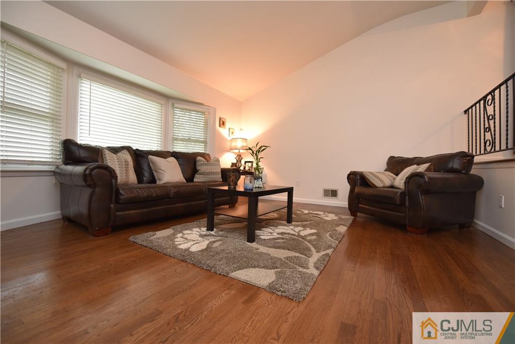 15 Dumas Road Old Bridge, NJ 08857 - Photo 5 of 15 a living room with furniture and a wooden floor