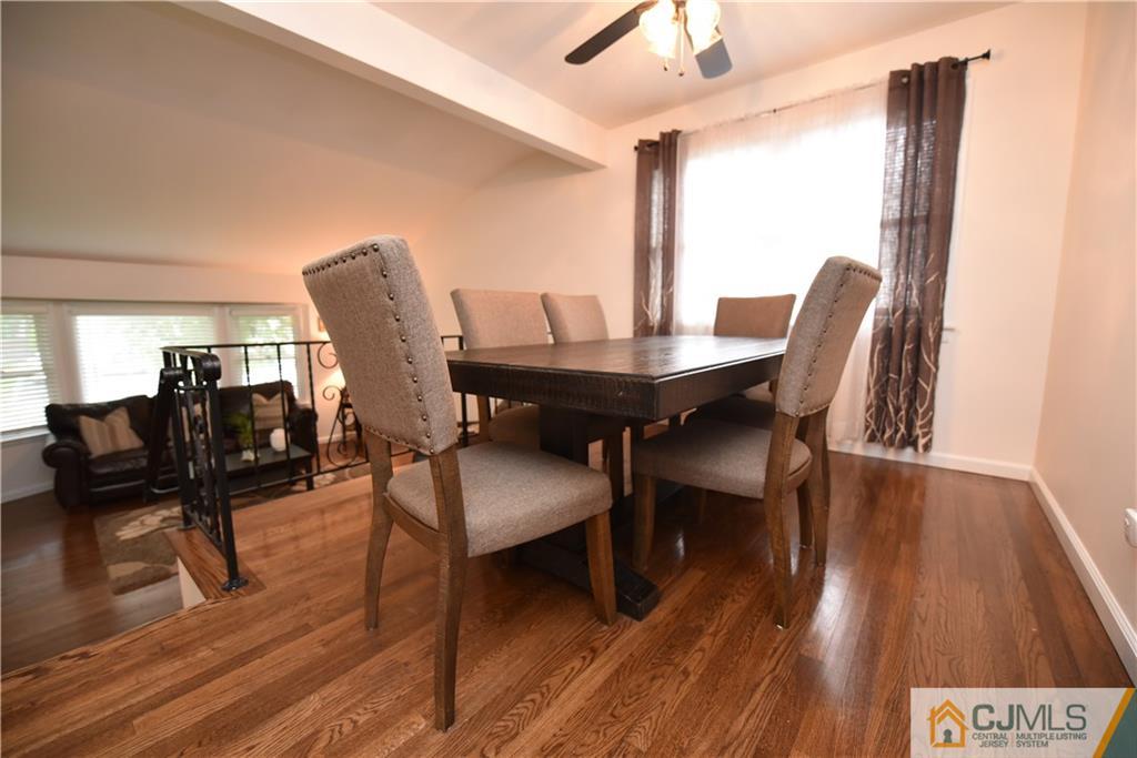 15 Dumas Road Old Bridge, NJ 08857 - Photo 6 of 15 a view of a dining room with furniture and wooden floor