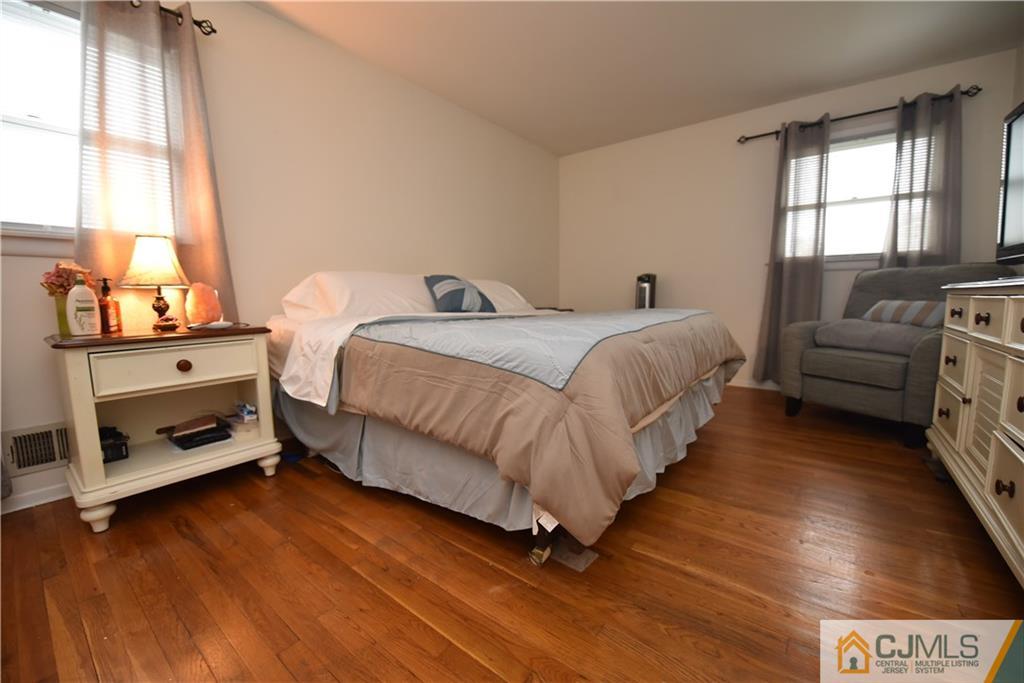 15 Dumas Road Old Bridge, NJ 08857 - Photo 7 of 15 a bedroom with a bed and a window