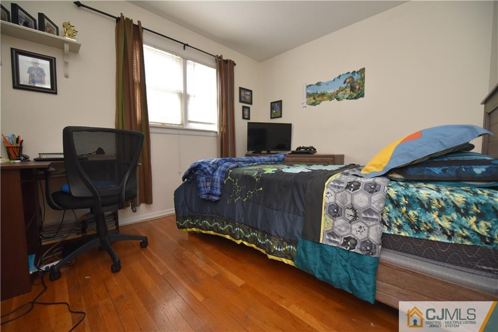 15 Dumas Road Old Bridge, NJ 08857 - Photo 10 of 15 a bedroom with a bed and a window