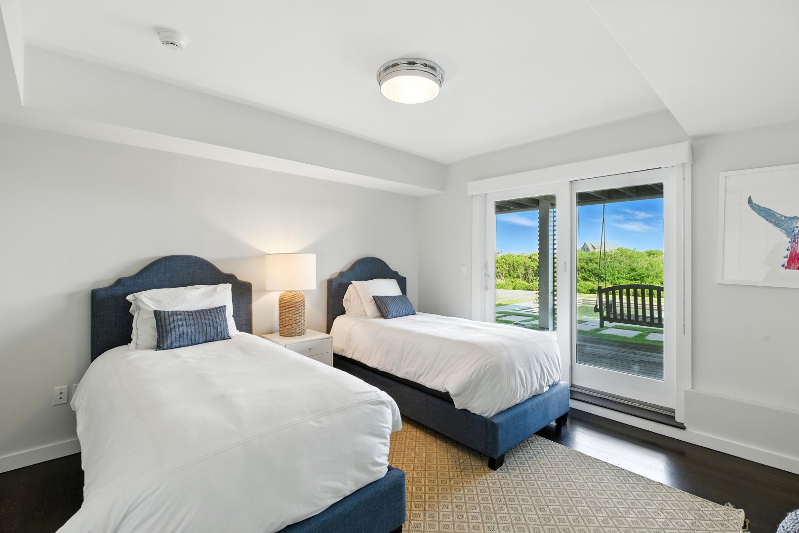 45 Starbuck Road Nantucket, MA 02554 - Photo 28 of 42 a bedroom with two beds and a large window