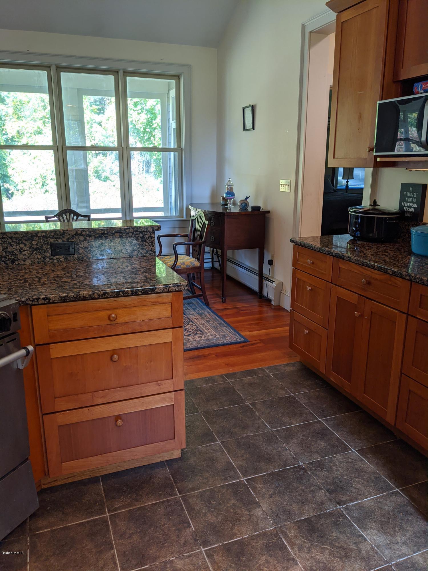 186 Bears Den Road Sheffield, MA 01257 - Photo 16 of 59 Kitchen thru L.R. to Screen Porch