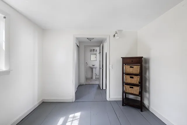 wooden floor and closet in a room