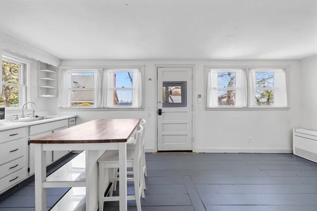 a room with furniture and window