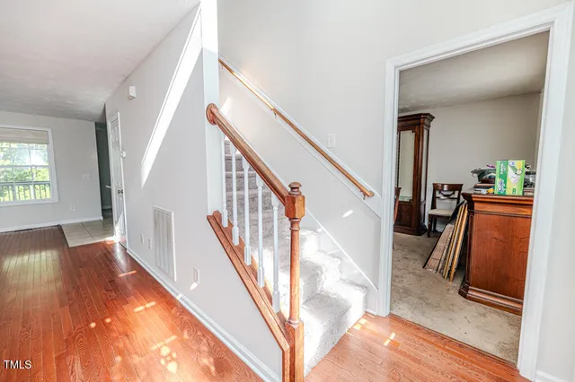 a bathroom with a sink a mirror and a shower