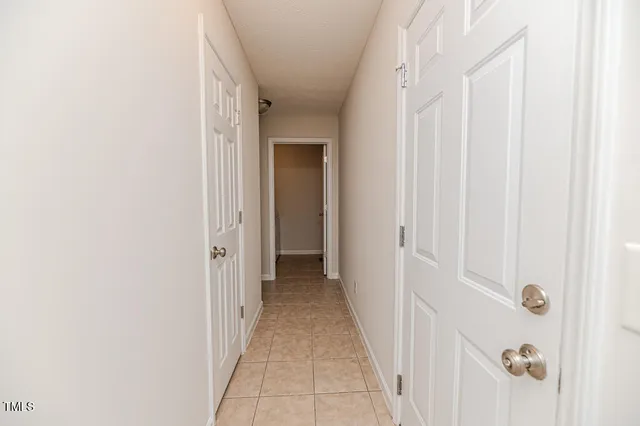 a kitchen with stainless steel appliances granite countertop a stove microwave and sink