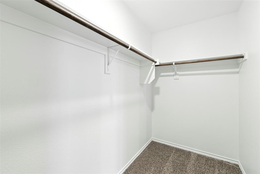 2808 Jasmine Drive Sherman, TX 75092 - Photo 20 of 38 a view of small space with racks on the wall