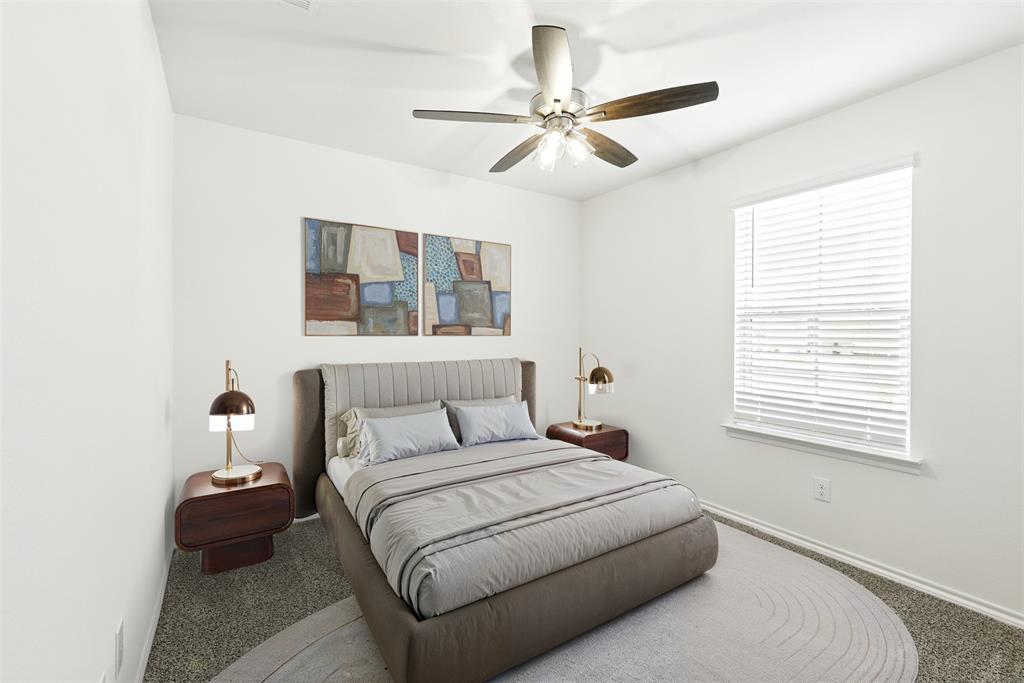 2808 Jasmine Drive Sherman, TX 75092 - Photo 6 of 38 a bedroom with a large bed and a window