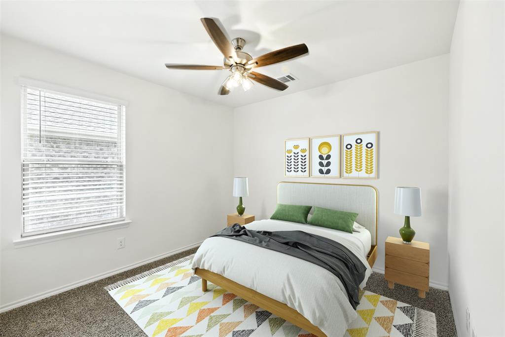 2808 Jasmine Drive Sherman, TX 75092 - Photo 7 of 38 a bedroom with a bed and a window