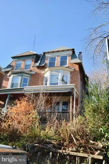 front view of a house with a street