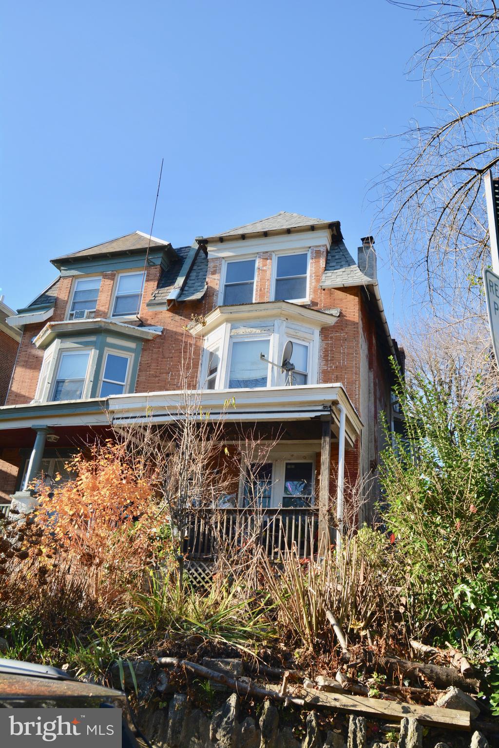 433 Hansberry Street, Unit 3 Philadelphia, PA 19144 - Photo 1 of 12 front view of a house with a street