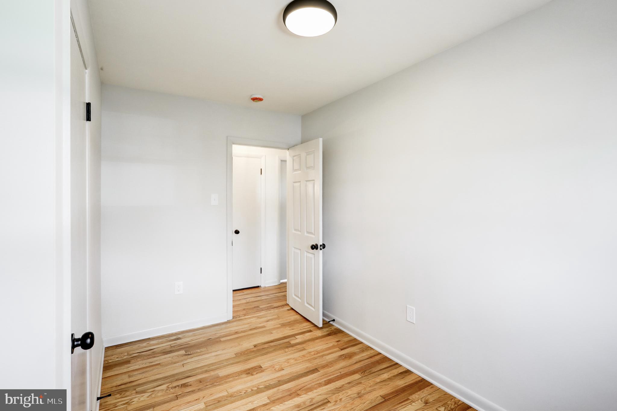 254 Blue Rock Road Millersville, PA 17551 - Photo 13 of 40 a view of a room with wooden floor and white walls