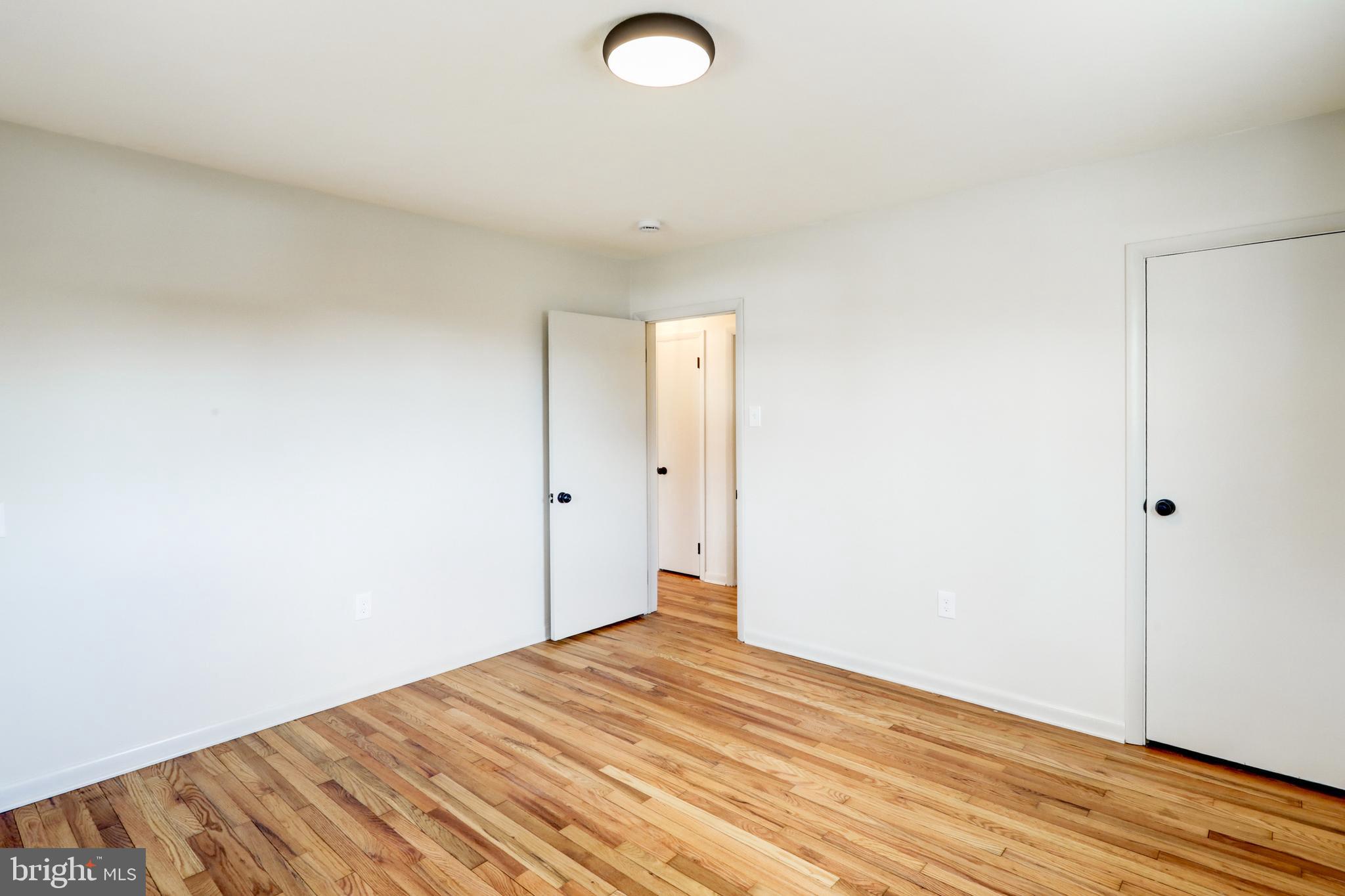 254 Blue Rock Road Millersville, PA 17551 - Photo 15 of 40 a view of empty room with wooden floor
