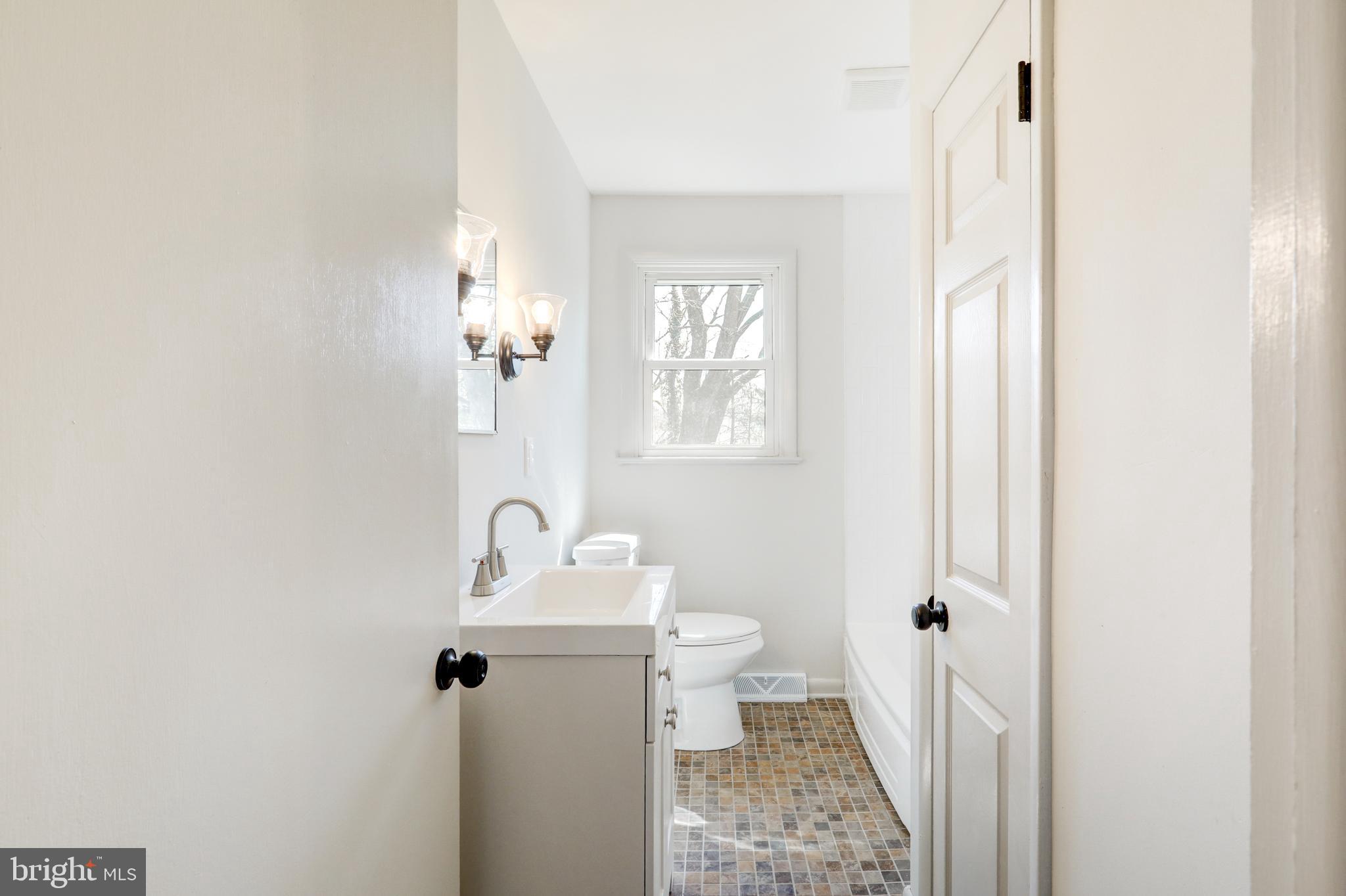 254 Blue Rock Road Millersville, PA 17551 - Photo 18 of 40 a bathroom with a sink toilet and shower