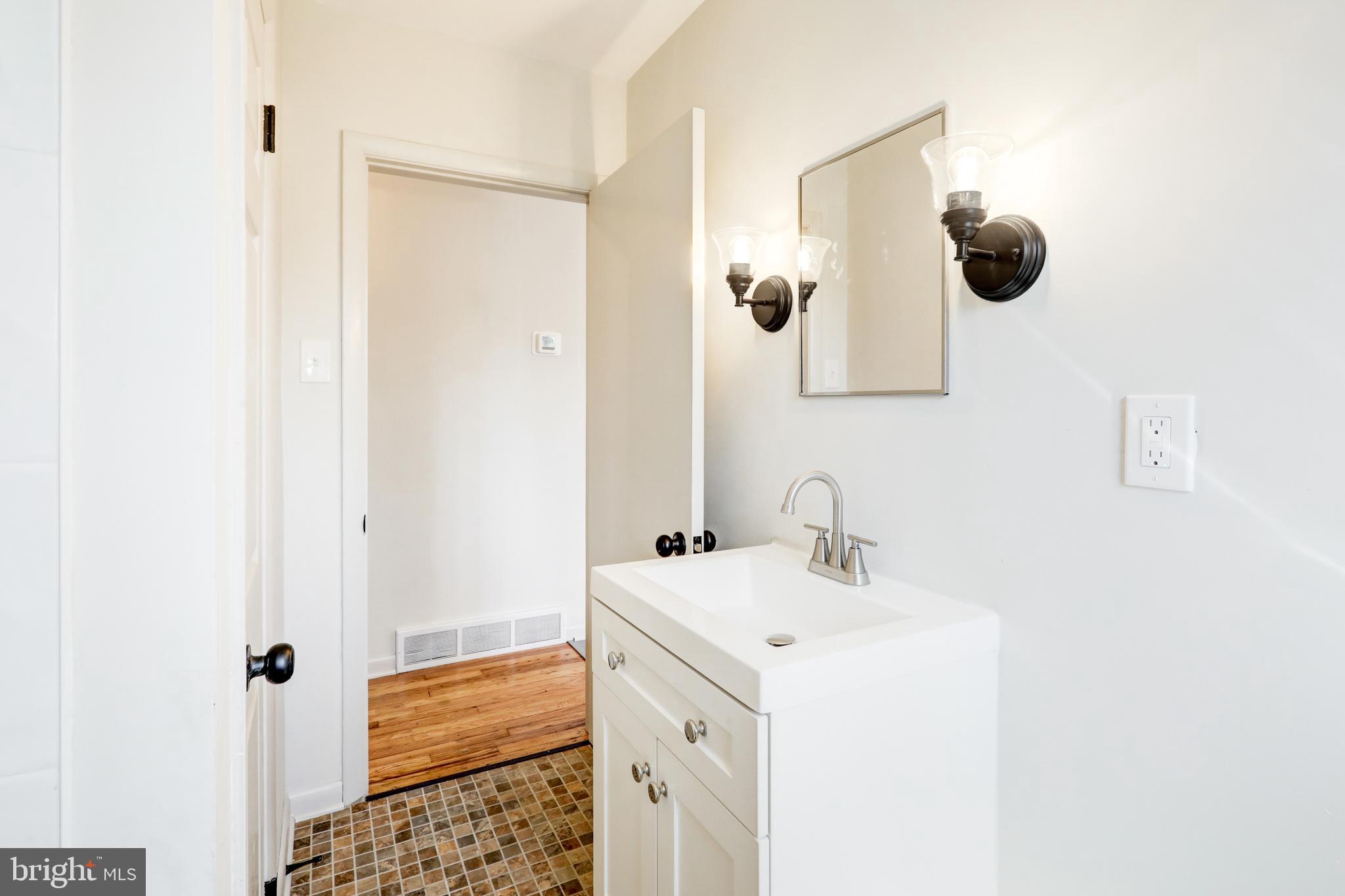 254 Blue Rock Road Millersville, PA 17551 - Photo 19 of 40 a bathroom with a sink and a mirror