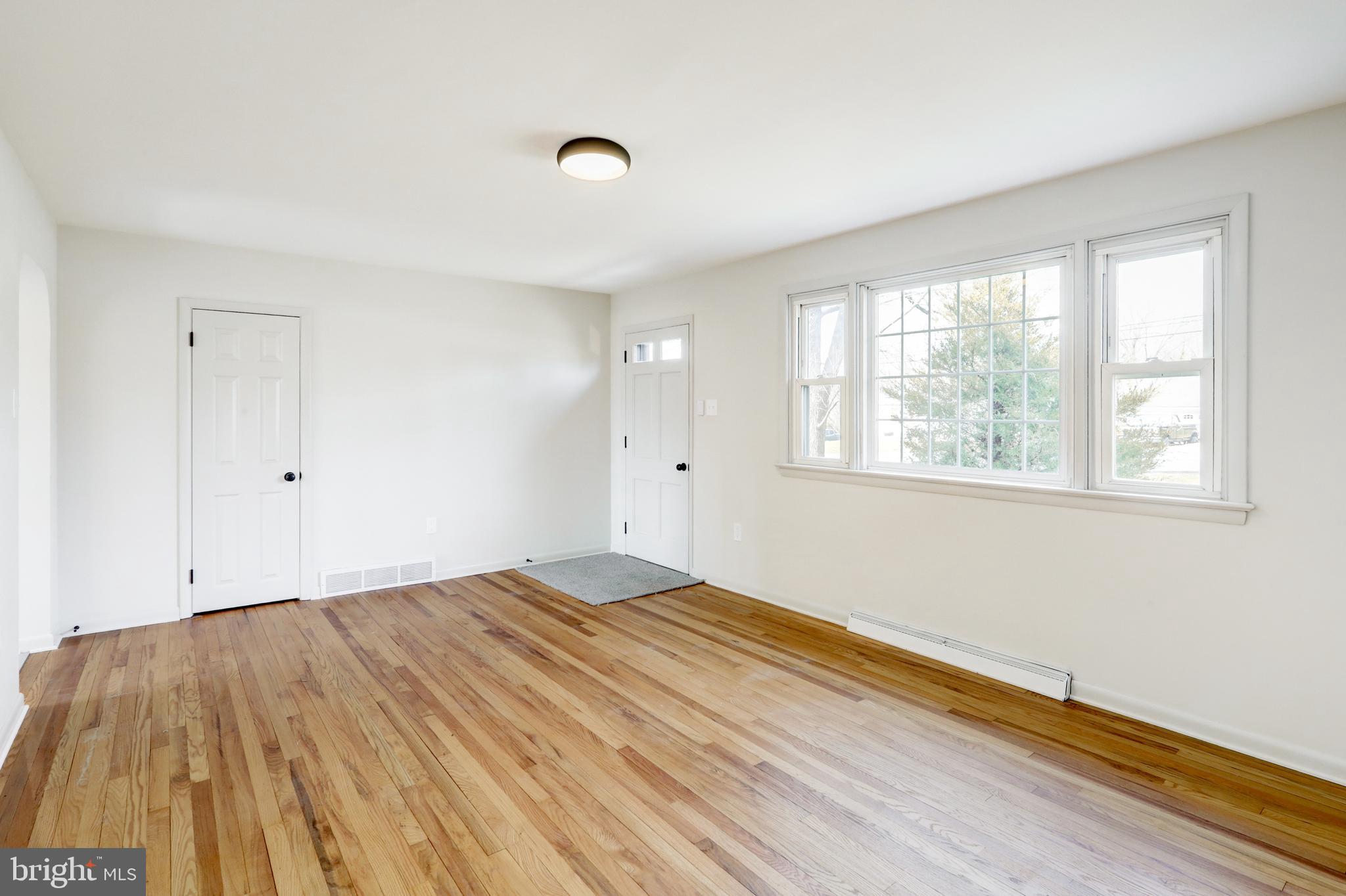 254 Blue Rock Road Millersville, PA 17551 - Photo 3 of 40 a view of empty room with wooden floor
