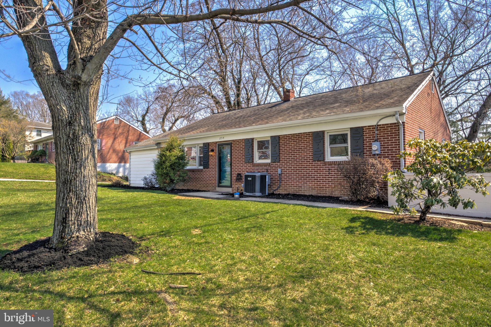 254 Blue Rock Road Millersville, PA 17551 - Photo 32 of 40 a view of a house with backyard and a tree